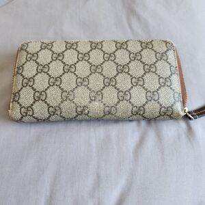 Authentic Gucci Hard Coated Zip Around Zippy Wallet